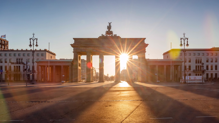 Night to Day Time Lapse of brandenburg gate with morning traffic, Berlin, Germany