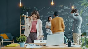 Time lapse of business lady working in shared office with group of people busy with job talking to colleagues, typing with laptop and reading papers. - Powered by Shutterstock - Get 15% off with code: PIKWIZARD15