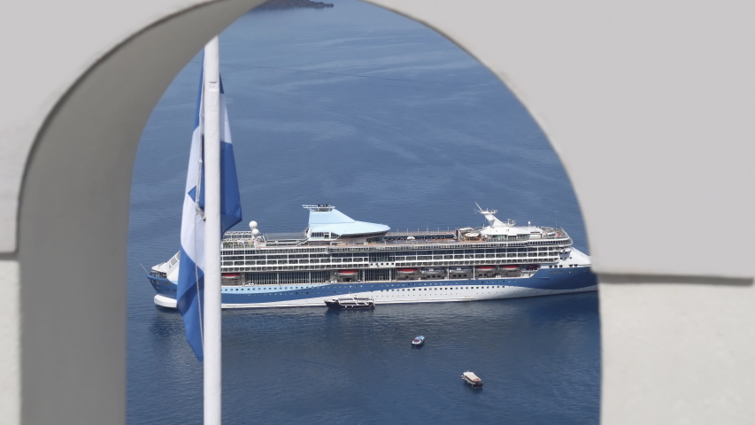 Large ferry cruiser ship anchored in Santorini island, Greece