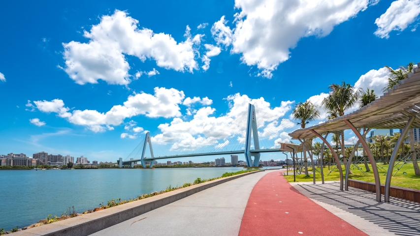 Haikou City Timelapse of the Century Bridge, the Iconic Landmark Cross-sea Bridge that Connects Haidian Peninsula and Downtown Area, Hainan Province, China, Asia.