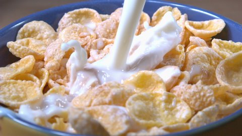 Milk Pouring into a Bowl of Cereal Splashing in Slow Motion Shot at 1000 fps