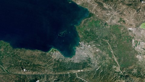 Satellite view time lapse city growth urban expansion animation , Port au prince Haiti. Images furnished by Nasa