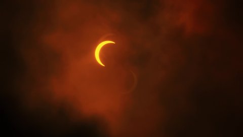 Solar Eclipse Partial. Getting covered by clouds. Dramatic. Near full eclipse. 21st June 2020. Hong Kong, Asia.