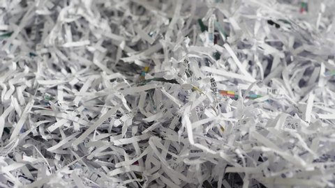 Shredded paper pollution waste of office tilt up shot