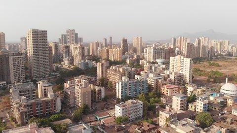 A drone aerial shot of city skyscrapers and buildings, Navi Mumbai, India 