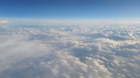 Flying over the clouds. 2 high quality videos of flying over the clouds
