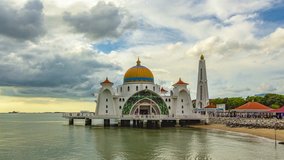 4K time lapse of sunset moments at Malacca Straits Mosque ( Masjid Selat Melaka). It is a mosque located on the man-made Malacca Island near Malacca Town, Malaysia