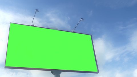 Green screen. Billboard over blue sky with clouds. Timelapse