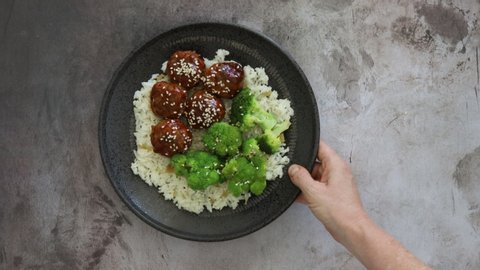 Serving Spicy Asian Meatballs and  White Rice with room for copy