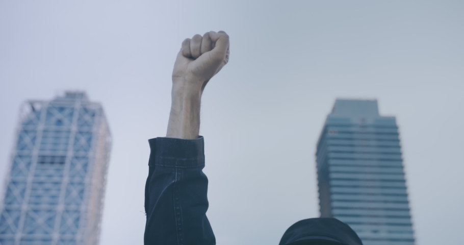 Man holding up hand at demostration protest. Social justice and peaceful protesting racial injustice Royalty-Free Stock Footage #1054730174