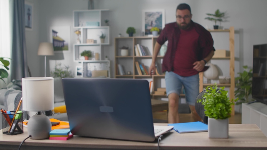 Moment of insight genial idea coming to mind of cute young man at living room