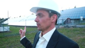 Video blog about environmental protection. Use of alternative energy in human life. An engineer blogger talks about use of solar panels in electrification of buildings.  - Powered by Shutterstock - Get 15% off with code: PIKWIZARD15