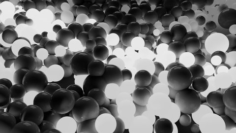 4k 3D seamless loop animation of beautiful gray and white small and large spheres or balls cover plane as abstract geometric background. Some spheres glow.