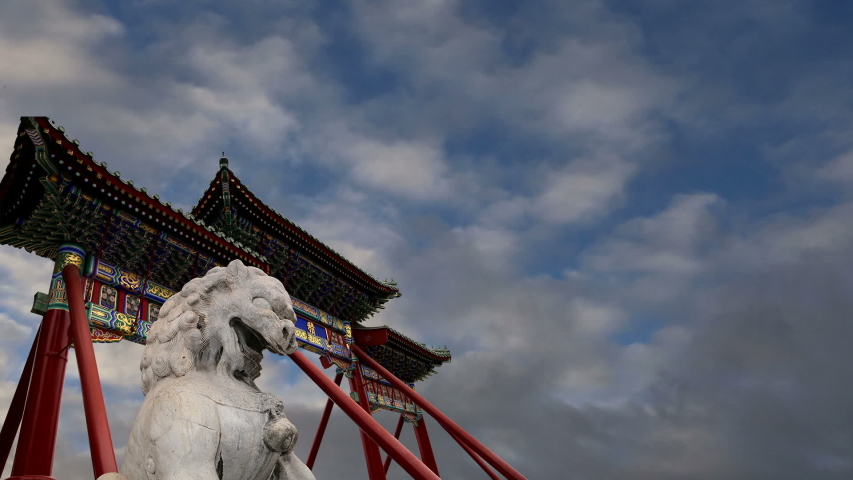 Stone Guardian Lion Statue in Beihai Park -- is an imperial garden to the northwest of the Forbidden City in Beijing, China  