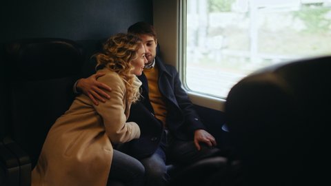 MS Couple traveling by train / Florence, Italy, People, Transportation