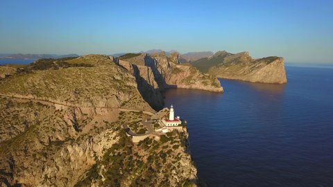 AERIAL WS Lighthouse on top of cliff of Cap de Formentor / Majorca, Spain