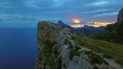 AERIAL WS Sunset over Cap de Formentor and Island of Illot el Colomer / Majorca, Spain
