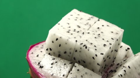 4K Dragon fruit cut isolated on Green Screen backgound