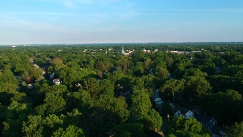 Westfield, NJ 06/22/20: A 4k Drone Shot Of A Drone Heading Towards The Presbyterian Church Of Westfield, NJ New Jersey At Tree Level Birds Eye View Over A Suburban Neighborhood In The Summer At Sunset