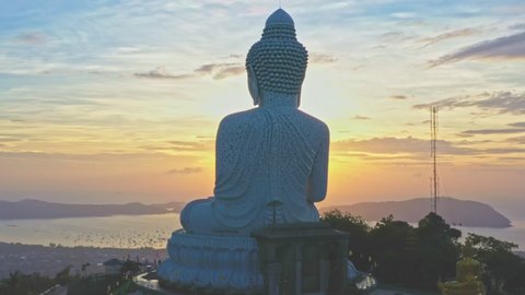 
aerial view blue sky and blue ocean are on the back of Phuket Big Buddha statue.
white Phuket big Buddha is the one of landmarks on Phuket island.