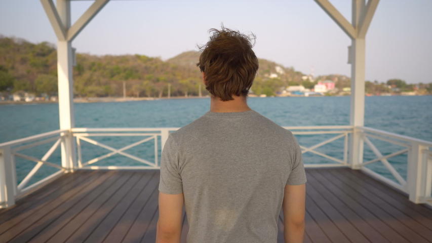 Happy Man Looking at Ocean View