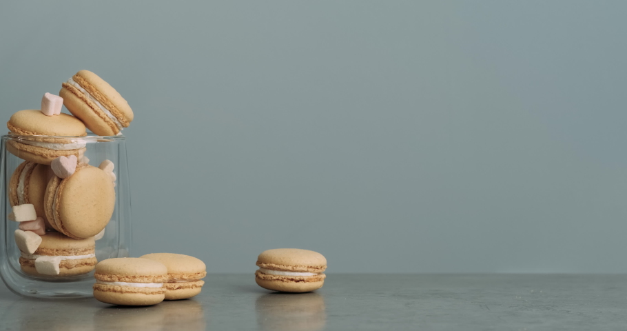 Handful of Delicious Yellow French Macarons on the Table