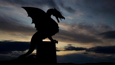 Dragon At Zmajski Most, Time Lapse at Sunrise with Fast Clouds and Dark Silhouette of Ljubljana Icon, Slovenia