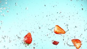 Super slow motion of strawberries flying up in the air with water splashes. Filmed on high speed cinema camera, 1000 fps. - Powered by Shutterstock - Get 15% off with code: PIKWIZARD15