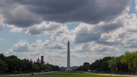 Billowing cumulus clouds form above the Washington Monument and National Mall in Washington, D.C. - Time lapse