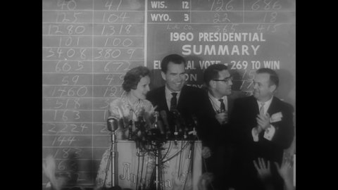 1960 - As election day winds down, Richard Nixon addresses his campaign team with a concession speech where he vows to support Kennedy as a president.