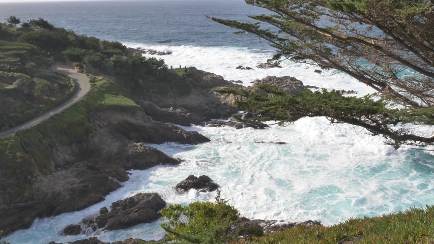 Majestic Big Sur coastline waves crashing on the cliff rocks at California