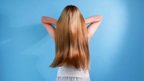 Women have shiny hair extensions.