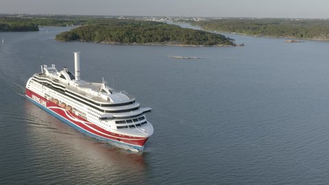 TURKU, FINLAND - JUNE 2020 - Drone aerial view of LNG powered ropax ferry ship with rotor sail operated by Viking Line.