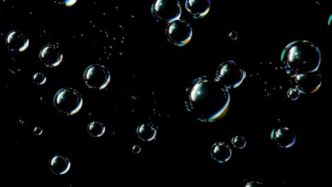 Soap Bubbles Grow and Burst on a Black Background. Beautiful Seamless Looped 3d Animation Ultra HD 4K 3840x2160