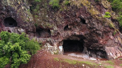 Aerial video about hermit caves in Danube bend. Fantastic ancient cave in Borzsony mountain. Amazing view of the visegrad hills and Domsod city. Untachable nature place next to Danube river.