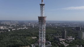 The architecture of Kyiv. Ukraine: TV tower. Aerial view. Slow motion