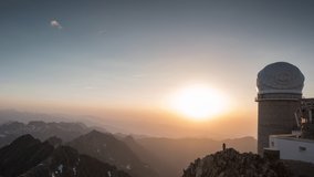 fast back and forth loopable time lapse of the sun moving in the sky above the Pic du Midi, France