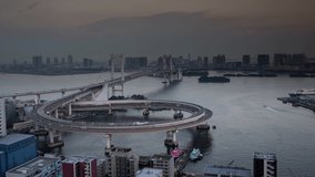 Night to day loopable time lapse footage of Rainbow Bridge, Tokyo, Japan