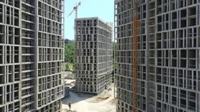 Construction of a multi-storey apartment building. Aerial video. Quadcopter. Drone. Multi-quarter house
