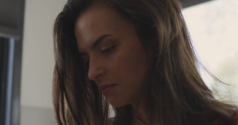 Close up of a woman feeling upset and hurt after serious fight with her boyfriend. Breaking up, cheating, jealousy, divorce concept. Shallow DOF, Close up, Slow motion, BMPCC 4K