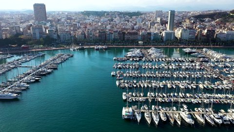 ALICANTE, SPAIN – MAY 29, 2020. Aerial view of the Marina Alicante and the buildings in the city center of Alicante, Spain.