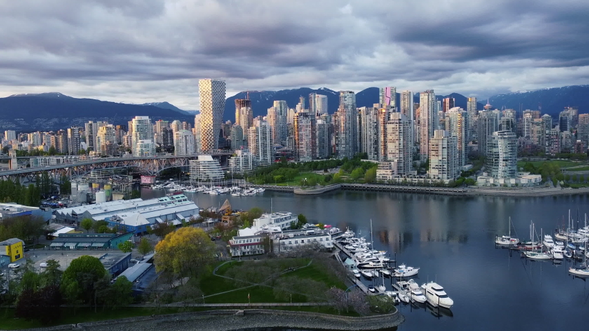 Sunset light over the downtown in Vancouver with the traffic on the bridge Royalty-Free Stock Footage #1054880384