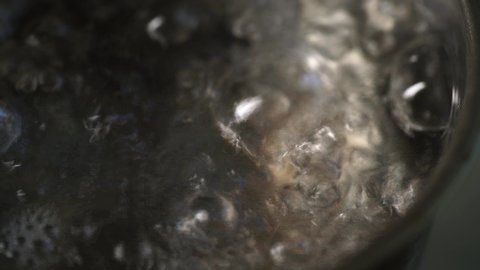Water boiling,Close-up in pot of boiling water,Bubbles of boiling water