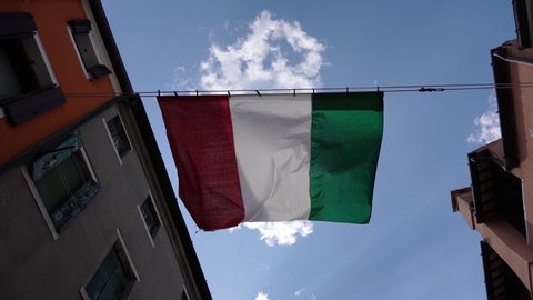 Italian flag waving near the Venetian houses
