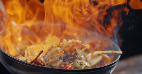 Side View Slow Motion Flambe Shrimp and Crab Shell 스톡 비디오