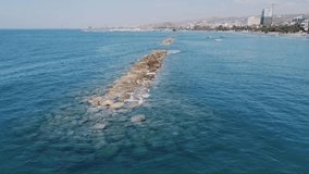 The drone span along the coastline of the city of Limassol, Cyprus. Breakwater.  Video is recommended to be used as a background. After lockdown