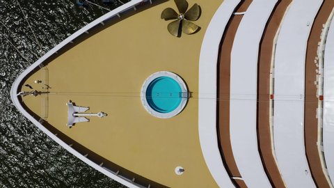 Aerial, top down view above a pool at the front of a cruise liner, passenger ship, on a bright, sunny day, in Lisbon, Portugal - screwdriver, drone shot