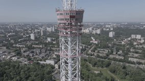 The architecture of Kyiv. Ukraine: TV tower. Aerial view. Slow motion, flat, gray