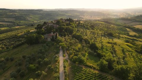 Tuscan countryside shot with drone at sunset time