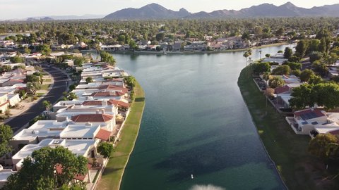 Aerial footage of Scottsdale, Arizona with Camelback Mountain in the horizon.